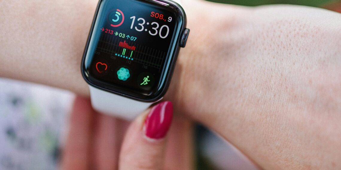 A close-up of a smartwatch displaying health stats