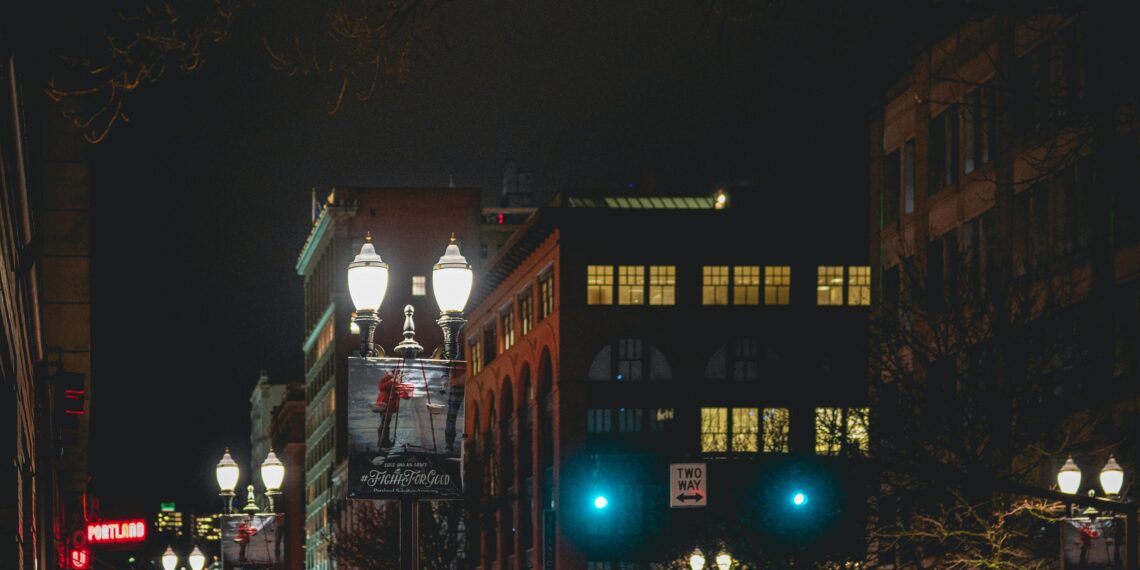 Neon signs glowing in a dark alley